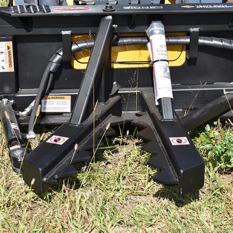 skid steer mounted post puller|skid steer attachments tree puller.